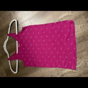 Magenta tank top with white hearts, soft fabric, Comfy and stretchable.